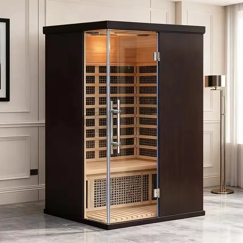 Black two-person infrared sauna in a bright home interior